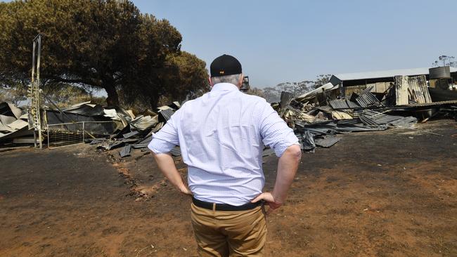 Prime Minister Scott Morrison visits a fire damaged property on Stokes Bay on Kangaroo Island, southwest of Adelaide on Wednesday.