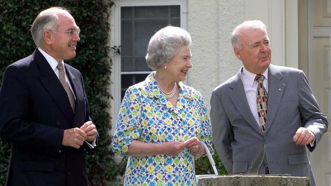 Queen Elizabeth, flanked by then prime minister John Howard and governor-general Sir William Deane, at Yaralumla in Canberra during her visit in 2000.