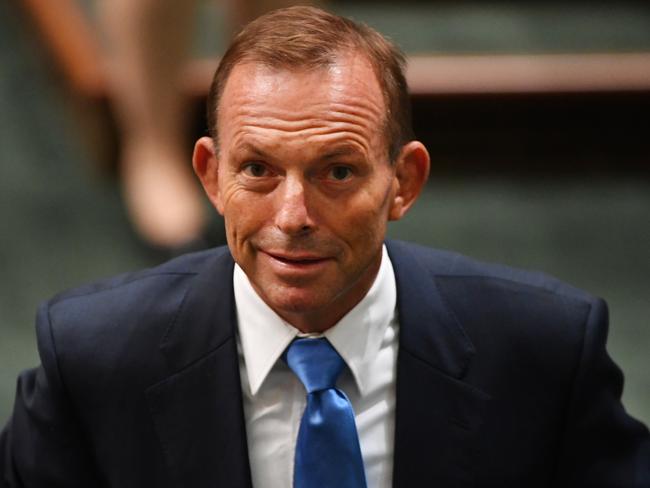 Former prime minister Tony Abbott leaves after Question Time in the House of Representatives at Parliament House in Canberra, Monday, Feb. 13, 2017. (AAP Image/Mick Tsikas) NO ARCHIVING