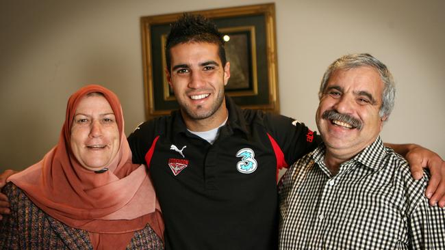 Bachar Houli with his mum Yamama and dad Malek when he entered the AFL