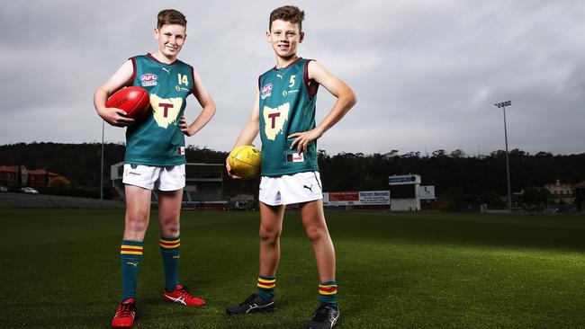 Members from the Tasmanian Devils under 12 footy team Oliver Cunningham, 12 of New Town and Archie Devine, 11 of Lindisfarne are excited to get an AFL team in Tasmania. Picture: Zak Simmonds