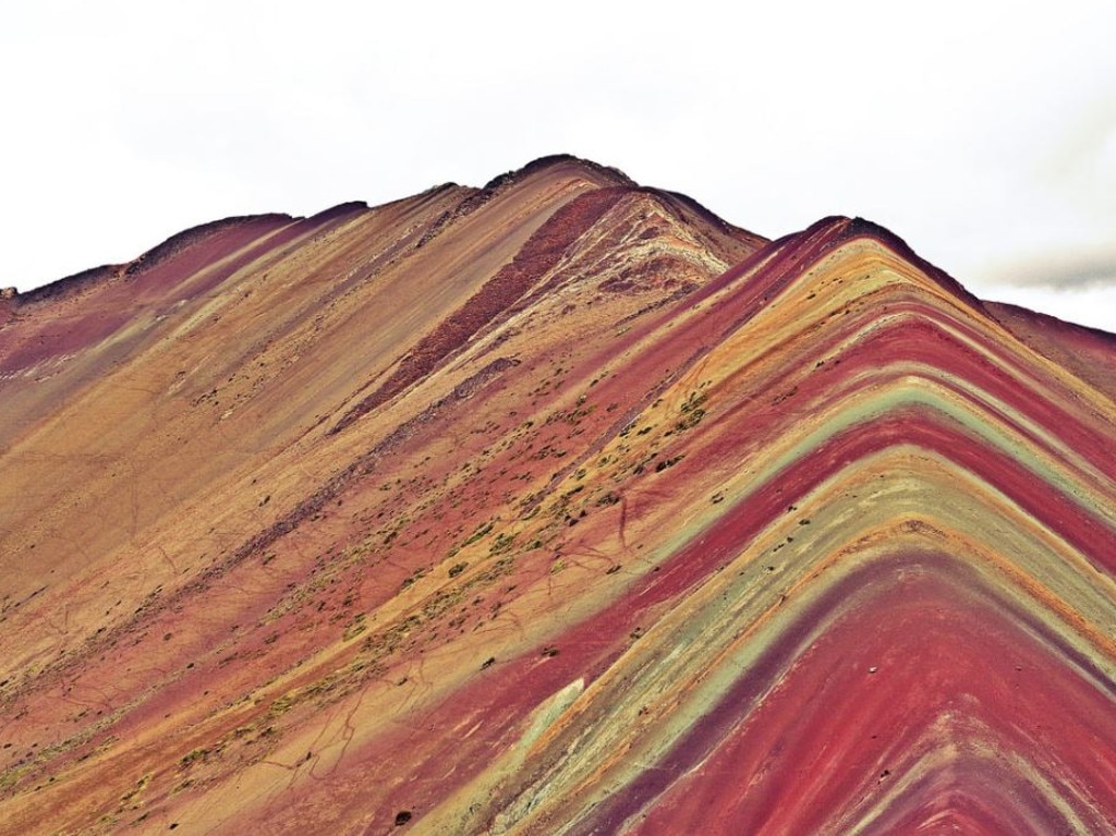 The 5000m peak of multi-coloured sediments was laid down millions of years ago, then pushed up clashing tectonic plates, but it's only within the last five years that the wonder has been discovered by outsiders. Picture: travelbusy.com/Flickr