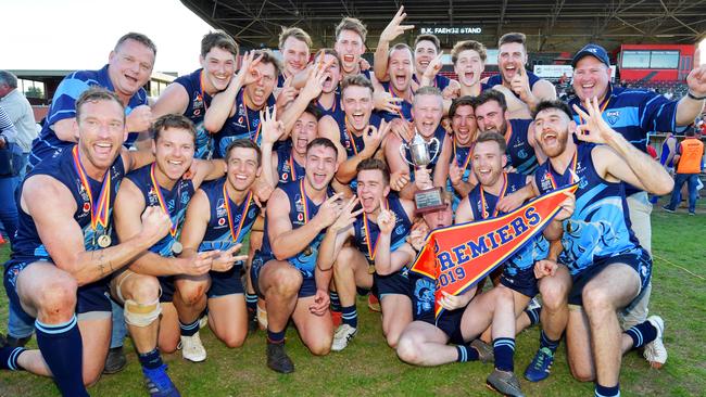 Glenunga celebrates after winning its third A grade Adelaide Footy League grand final in a row. The Rams beat Ignatians in the division three grand final at Richmond Oval on Saturday. Picture: AAP/Mark Brake