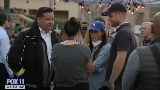 Prince Harry and Meghan Markle visited victims of the Eaton Fire in LA. Picture: FOX 11 Los Angeles