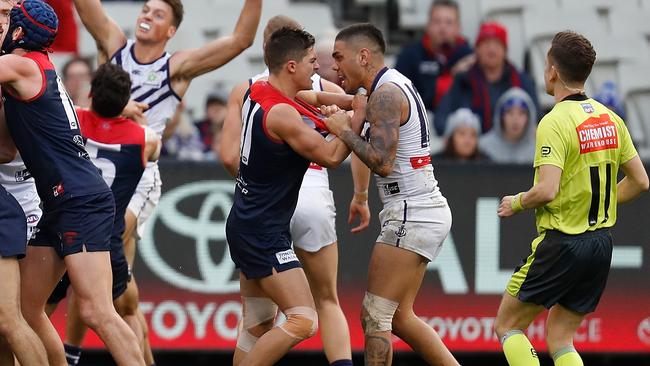 Jay Lockhart of the Demons and Michael Walters of the Dockers clash during the 2019 AFL round 14 match between the Melbourne Demons and the Fremantle Dockers. Picture: Michael Willson/AFL Photos via Getty Images