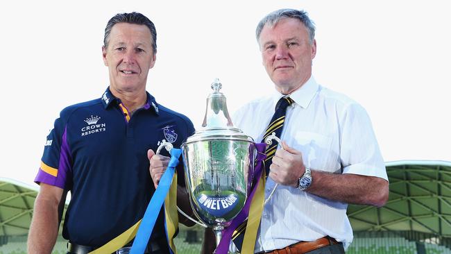 MELBOURNE, AUSTRALIA — NOVEMBER 14: Melbourne Storm Head Coach Craig Bellamy (L) and Leeds Rhino's CEO Gary Hetherington pose with the World Club Challenge Trophy during a Melbourne Storm NRL media announcement at AAMI Park on November 14, 2017 in Melbourne, Australia. NRL Premiers Melbourne Storm will host English Super League Premiers Leeds Rhinos in the World Club Challenge to determine the world's best rugby league team. (Photo by Michael Dodge/Getty Images)