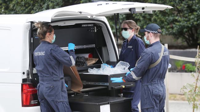 Police at the scene of the stabbing on Thursday. Picture: David Crosling