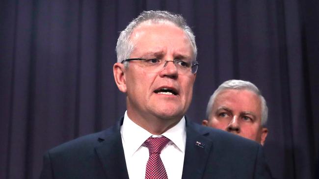 Nationals leader Michael McCormack (right) keeps a close eye on Prime Minister Scott Morrison.