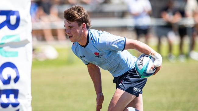 NSW player Angus Grover scoring against the Reds. Picture: Julian Andrews