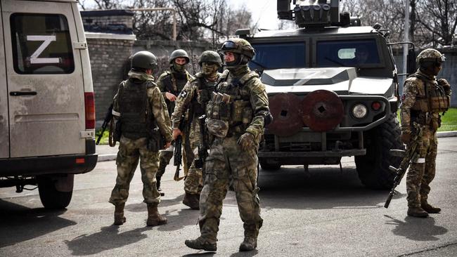 Russian soldiers patrol a street in Volnovakha in the self-proclaimed Donetsk People's Republic. Picture: AFP