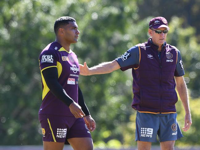 Tevita Pangai Junior and coach Wayne Bennett are seen during the Brisbane Broncos training session in Brisbane, Wednesday, August 22, 2018.  (AAP Image/Dave Hunt) NO ARCHIVING