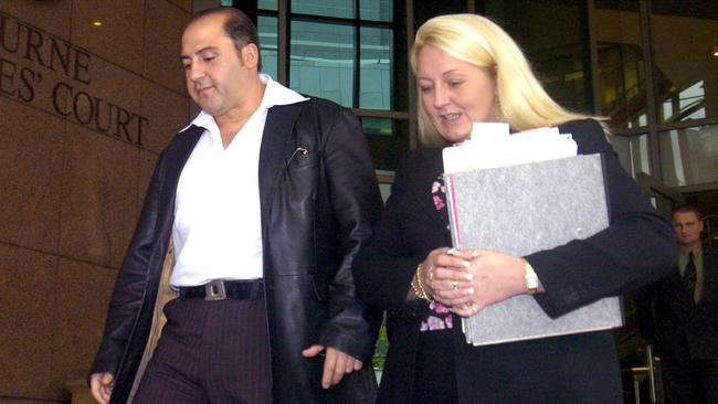 Tony Mokbel leaving Melbourne Magistrates Court with Gobbo. 