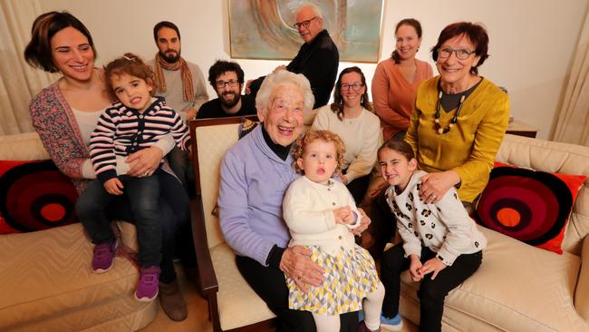 Heddy Setton, 92, surrounded by a further three generations of her family including daughter Talya Pasmanik, 68, right, and her husband Joe, 72, back, with grandchildren Davina, 38, Len, 43, Philip, 31, Michelle, 40, Katherine, 36, and great-grandchildren Mali, 7, Poppy, 4, and Tara, 2. Picture: Stuart McEvoy.