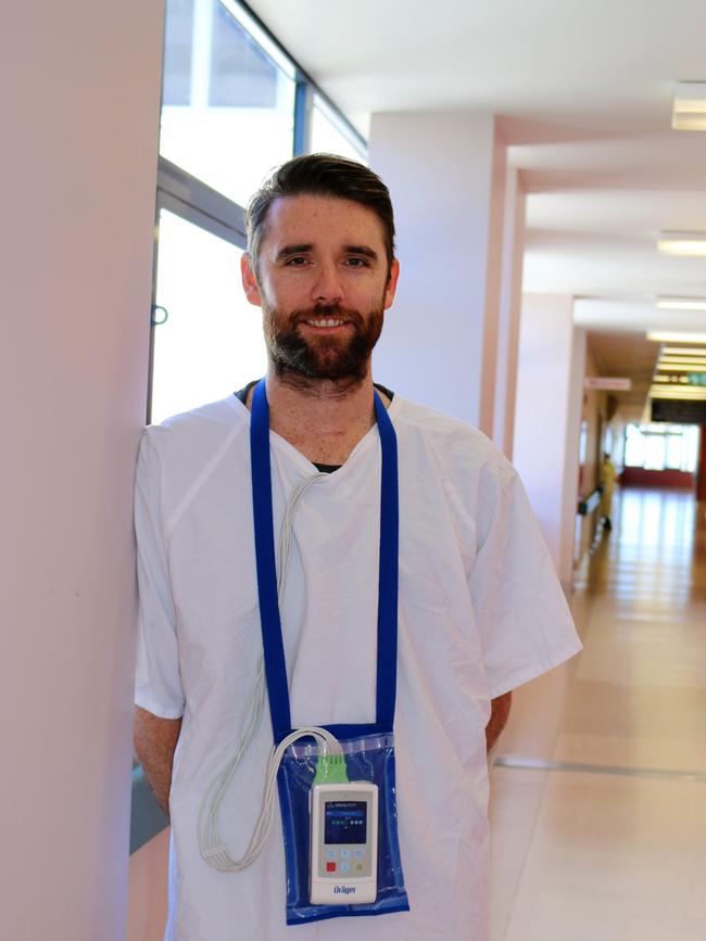 Allan Bate with one of the new cardiac monitors at Prince of Wales Hospital. They are portable so he can walk around with it on.