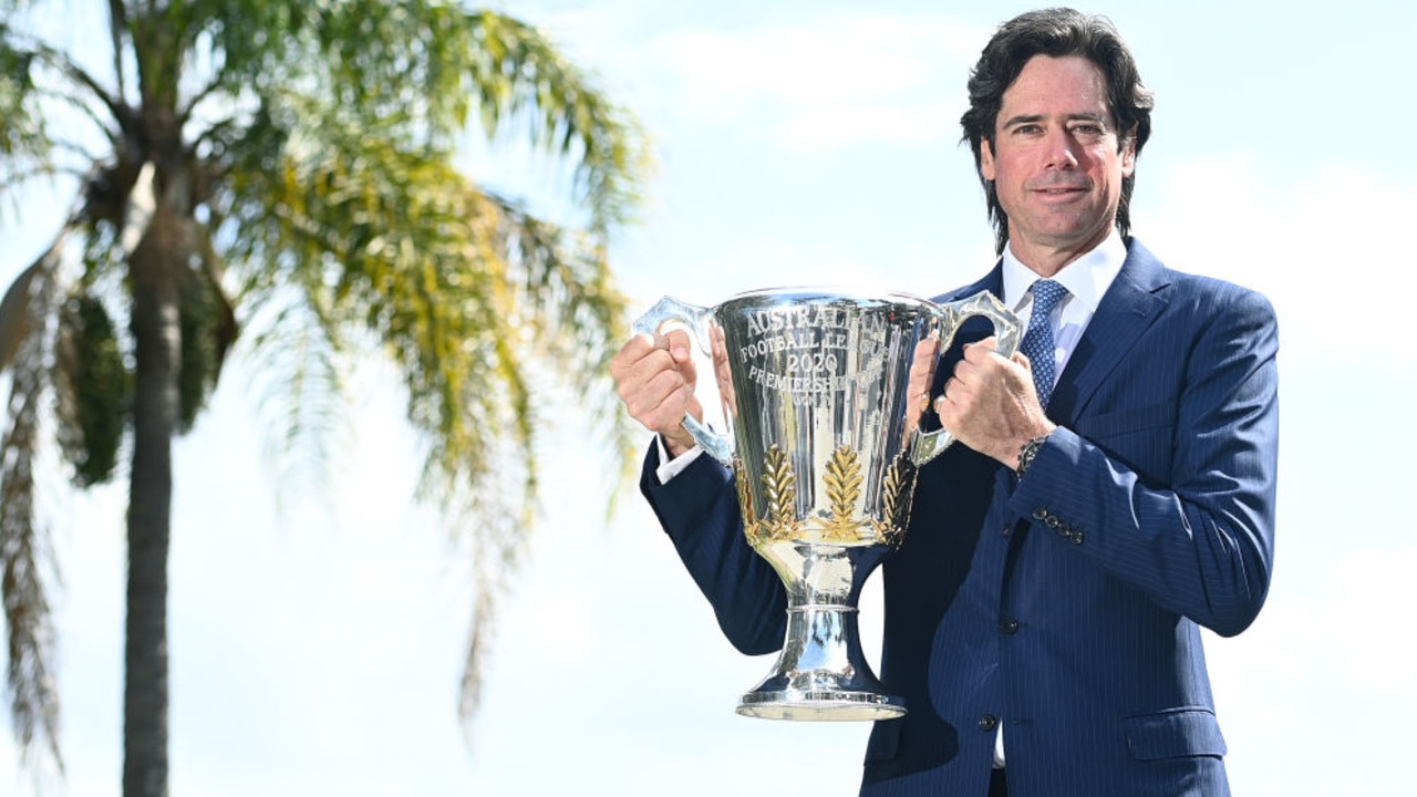 GOLD COAST, AUSTRALIA - SEPTEMBER 02: AFL Chief Executive Gillon McLachlan poses with the Premiership Trophy during a press conference announcing to media from the Queensland Quarantine Hub that the 2020 AFL Grand Final will be played at the Gabba on September 02, 2020 in Gold Coast, Australia. (Photo by Quinn Rooney/Getty Images)