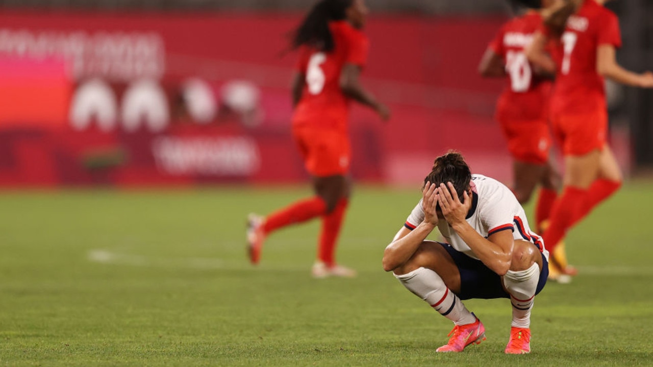 US player Carli Lloyd held her head in her hands following her side’s loss to Canada. Picture: Francois Nel/Getty Images