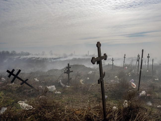 Smoke hangs over the cemetery of Mykolaiv, southern Ukraine.