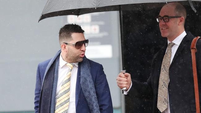 Richard Lightfoot (left) leaving Wyong Local Court with his barrister Jack Tyler-Stott after being served with fresh drugs charges. Picture: Sue Graham