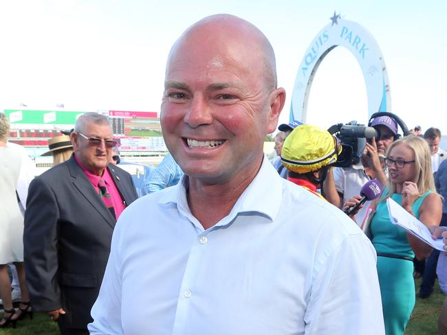 Gold Coast Turf Club race meeting, featuring two major lead in races to the Magic Millions.Photo of race 7. Photo of winner number 9 SNOW VALLEY. Jockey is Robbie Fradd, trainer is Matthew Dunn (pictured).Photo by Richard Gosling