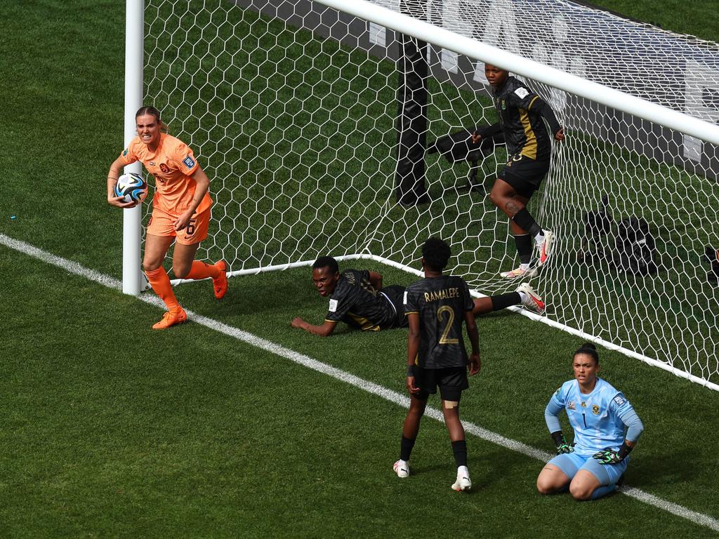Jill Roord retrieves the ball from the back of the net after scoring the opening goal for the Netherlands versus South Africa. Picture: Charlotte Wilson//Offside via Getty Images