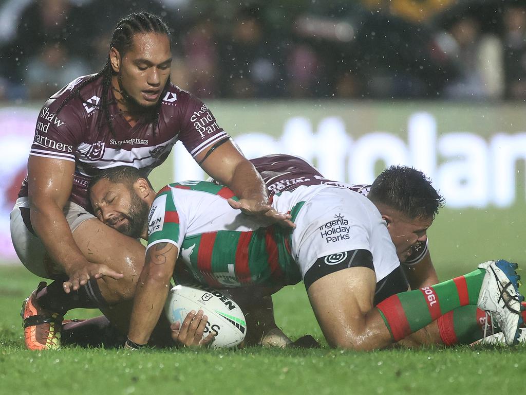 Marty Taupau was smacking Benji Marshall with one hand and saving him with the other.