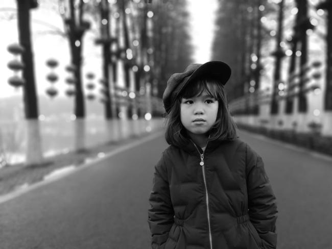 Imogen Carter walking on her own through the normally crowded Dong Hu Eastern Lake park in Wuhan. Picture: Simon Carter