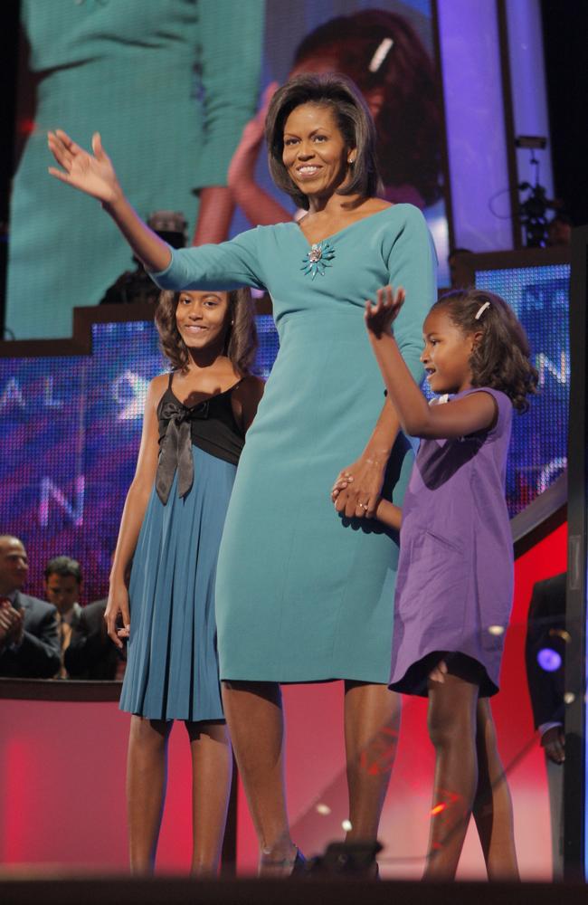 Michelle Obama, daughters Malia, left, then 10, and Sasha, right, then 7, pictured in 2008. Picture: Jae C. Hong/AP Photo