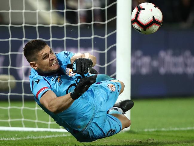Perth Glory goalkeeper Liam Reddy saves a penalty during the semi-final against Adelaide United. Picture: Getty Images
