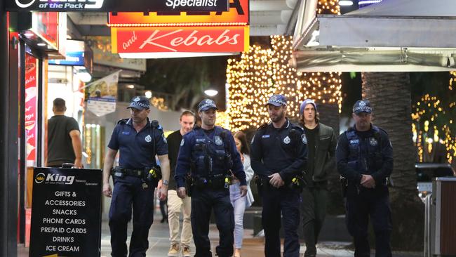 Police on patrol in Surfers Paradise. Picture Glenn Hampson.