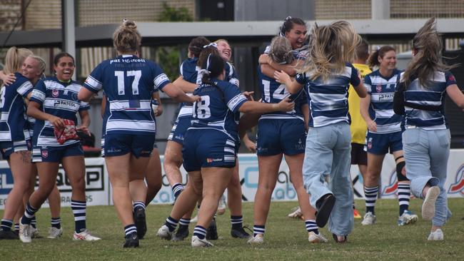 Rockhampton Brothers celebrate after claiming their fourth straight open women's premiership.