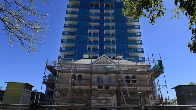 Davaar House in front of the August Towers construction site on Hutt Street. Picture: Naomi Jellicoe