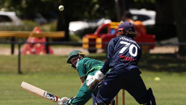 Caulfield’s Daniel Forbes got this one away. Picture: Hamish Blair