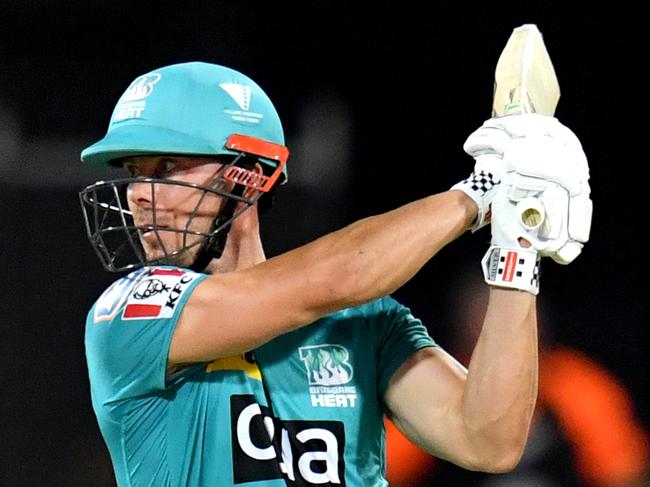 Chris Lynn (right) of the Heat hits four runs during the Big Bash League (BBL) cricket match between the Brisbane Heat and Melbourne Renegades at the Gabba in Brisbane, Sunday, January 19, 2020. (AAP Image/Darren England) NO ARCHIVING, EDITORIAL USE ONLY, IMAGES TO BE USED FOR NEWS REPORTING PURPOSES ONLY, NO COMMERCIAL USE WHATSOEVER, NO USE IN BOOKS WITHOUT PRIOR WRITTEN CONSENT FROM AAP