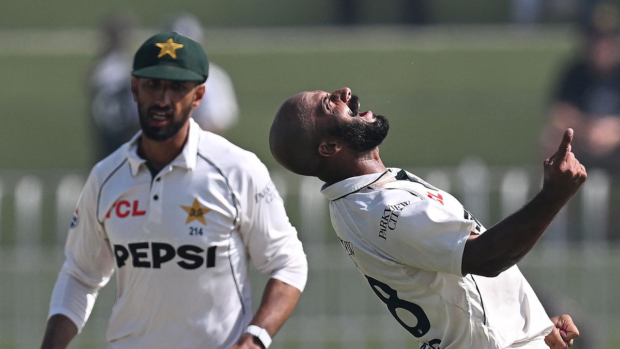 Sajid Khan celebrates a wicket. Photo by Aamir QURESHI / AFP