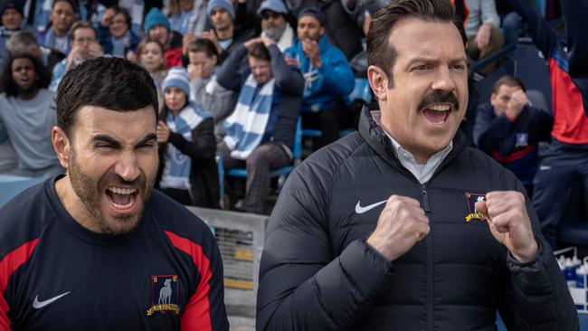 Jason Sudeikis as Ted Lasso (centre) with co-stars and co-writers Brett Goldstein (left) and Brendan Hunt (right).