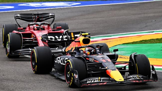 Charles Leclerc (Ferrari) attacks Sergio Perez before spinning out. Picture: Clive Mason/Getty