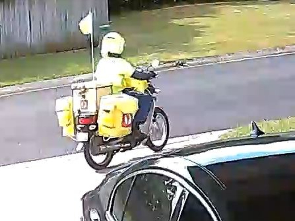 The postie is seen riding off after a confrontation with the homeowner.