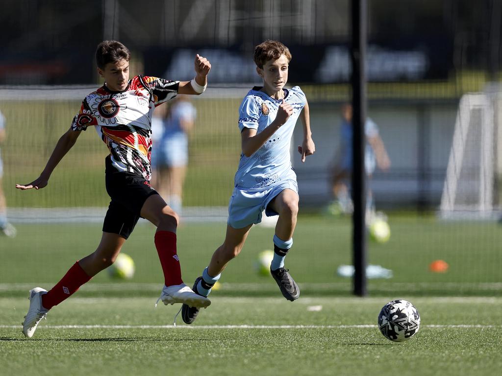 Adam Mohana (right), U14 Boys NAIDOC Cup at Lake Macquarie Regional Football Facility. Picture: Michael Gorton