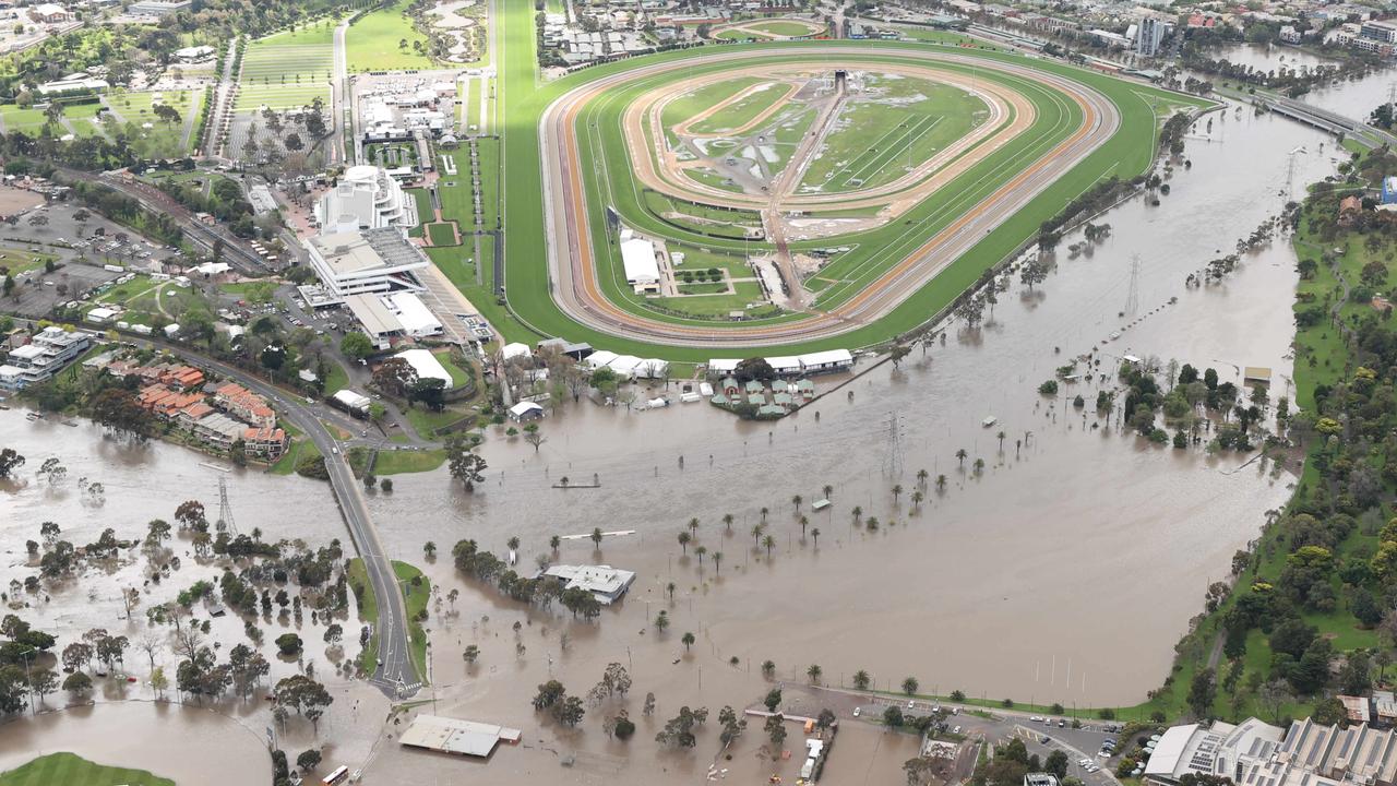 Aerial photos of flood waters enter homes and streets by the Maribyrnong River in the Flemington area. Picture: David Caird