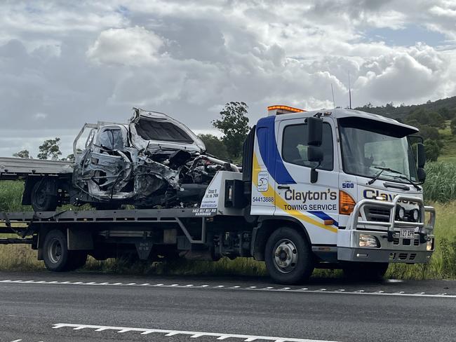 Fruit truck and car in head-on crash off Bruce Hwy