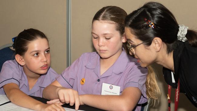 Kylah Sampson, Madi Williamson from St Brendan's Catholic Primary School and Katina Webb at the 2022 Mackay Youth parliament. Picture: Michaela Harlow