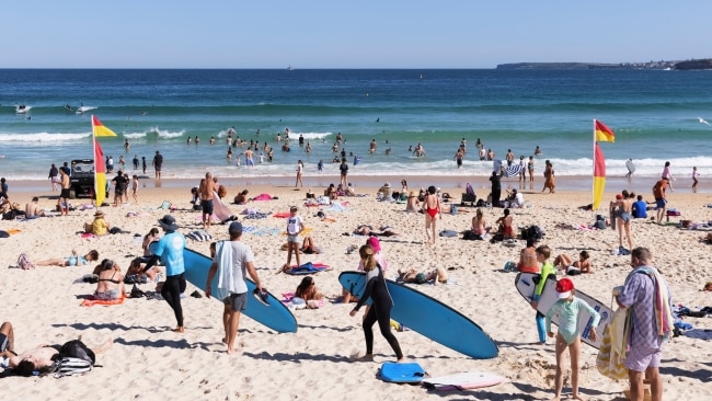 Crowds gather at Bondi Beach on October Monday. Picture: Brook Mitchell/Getty Images