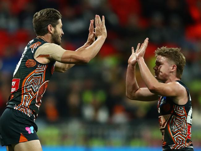 Callan Ward celebrates one of two goals against the Blues, the third-straight week he’s kicked two goals in a game. Picture: Brett Costello