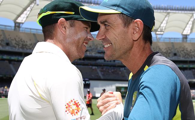 Marcus Harris and coach Justin Langer celebrate the win in Perth. Picture: Getty