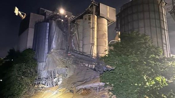 The two silos collapsed after 10pm on Thursday night. Picture: Fire and Rescue