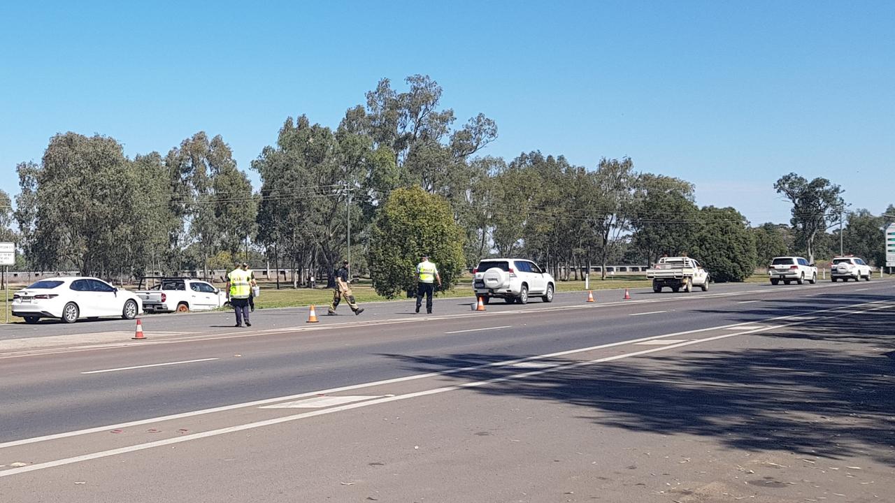 Roma district police conducting roadside breath and drug testing during road safety week.