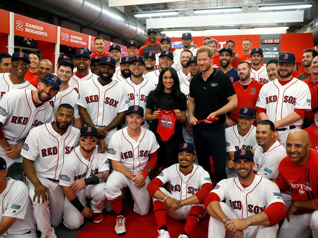 Meghan and Harry with the Red Sox. Picture: Getty