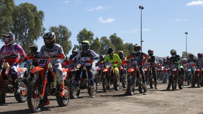 The bikes line up to take off at Alice Springs on day one of the 2025 Finke Desert Race, June 8, 2025. Picture: Gera Kazakov