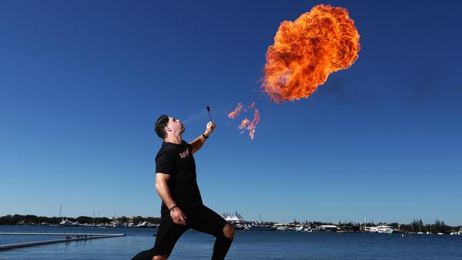 Gold Coast Magician Apollo Jackson at Broadwater Parklands showing off his skills. Photograph: Jason O'Brien