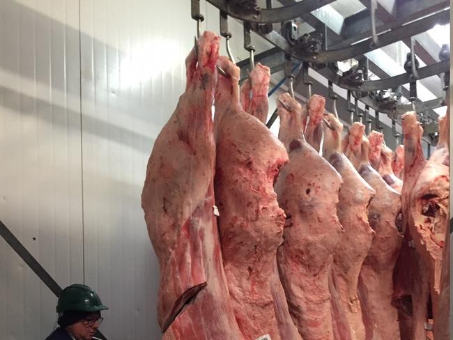 PADDOCK TO PLATE: Biggenden Meatworks' Gavin Kelly with the "on the hook" exhibits in the Biggenden Show Society's in the prime cattle class.